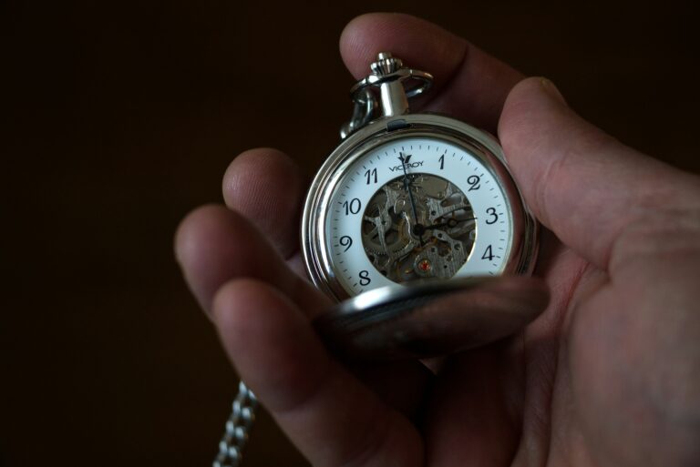 hand holding stopwatch