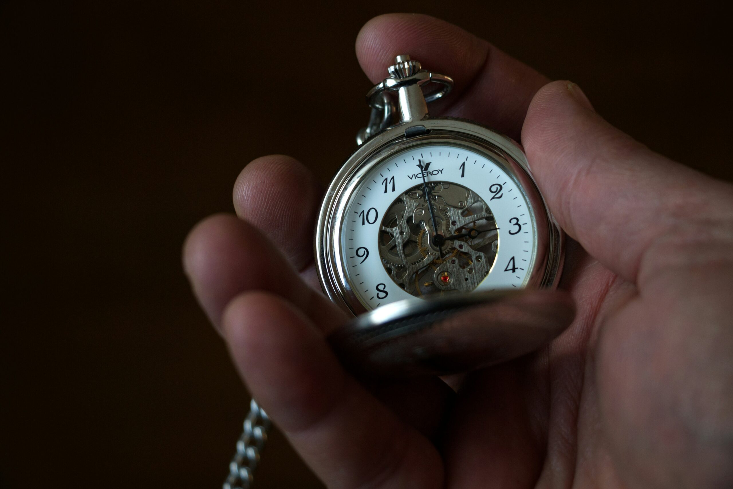 hand holding stopwatch