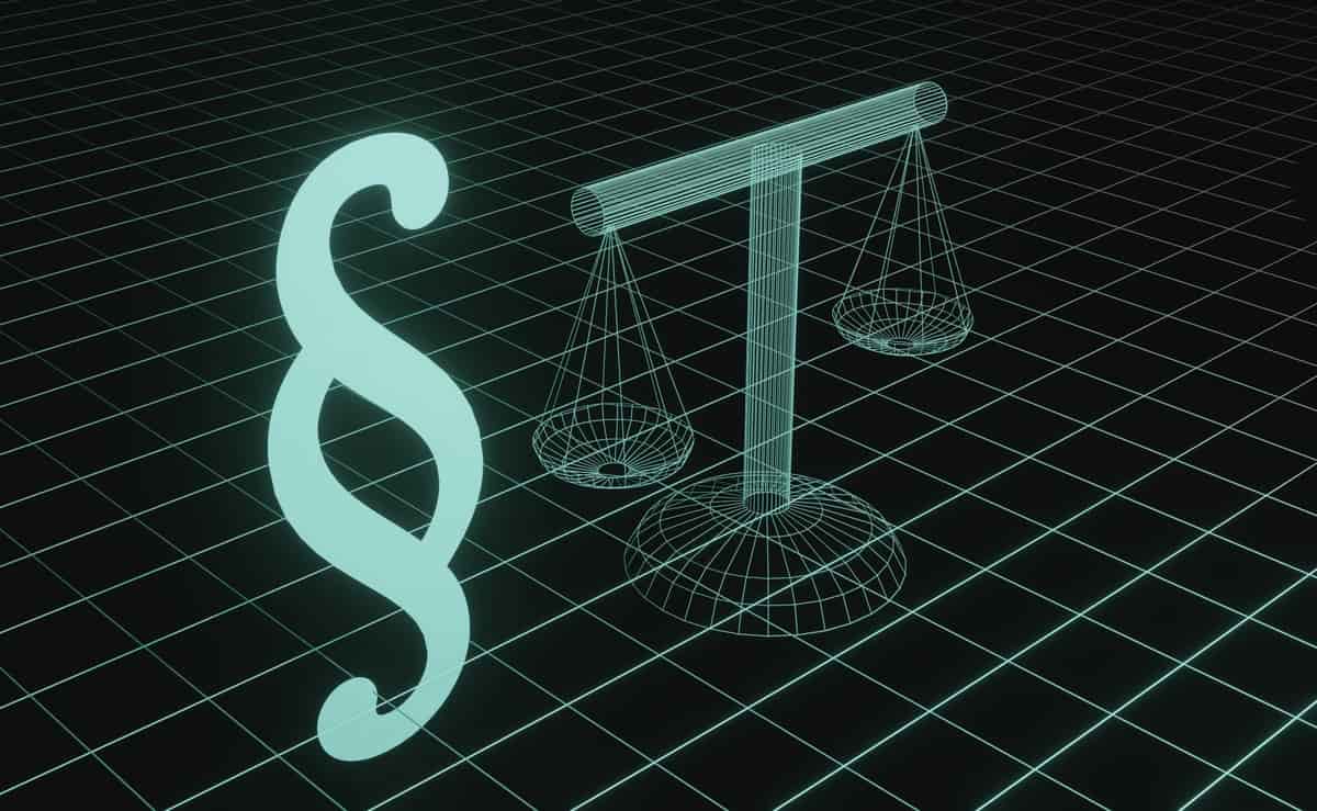 A glowing section sign beside a wireframe set of scales on a dark grid.